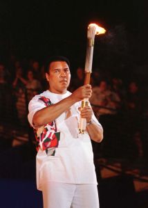 Muhammad-Ali-lighting-Olympic-Torch-in-1996